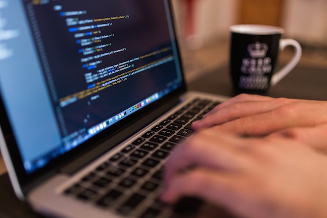 laptop with cup of coffee